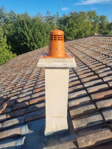 Gainage en PPTL du conduit des fumées et réalisation de la sortie sur boisseau